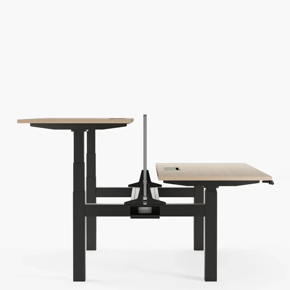 Colleagues gathering around a raised desk for a quick standing meeting